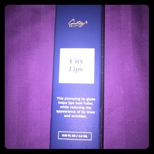 City Lips, Clear NIB Sealed Was: $35 Now $29